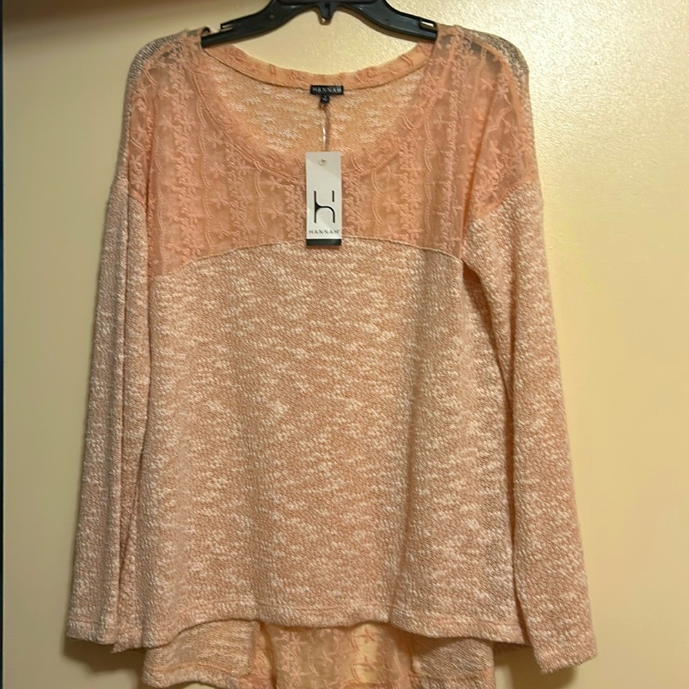 New. Lovely pink/peachy sweater.